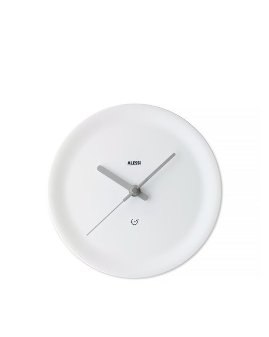 Minimal wall clock, that's designed specifically to be hung in a corner. Made from plastic, the clock is white and features no numbers, the beauty lies in it's unusual way to be hung in a room.