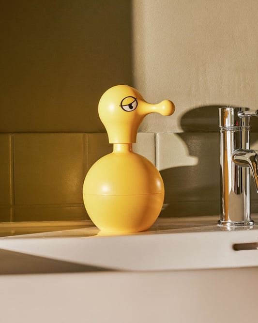 Mr Cold liquid soap dispenser for the kitchen or bathroom. Duck-shaped refillable pump action soap dispenser in yellow thermoplastic