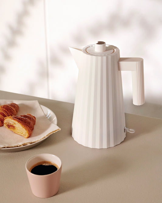 The iconic and uniquely designed Plisse electric kettle with pleated features in thermoplastic. Designed by Michele De Lucchi this electric kettle is very much a piece of art as well as an everyday practical kitchen accessory. 1.7litre capacity