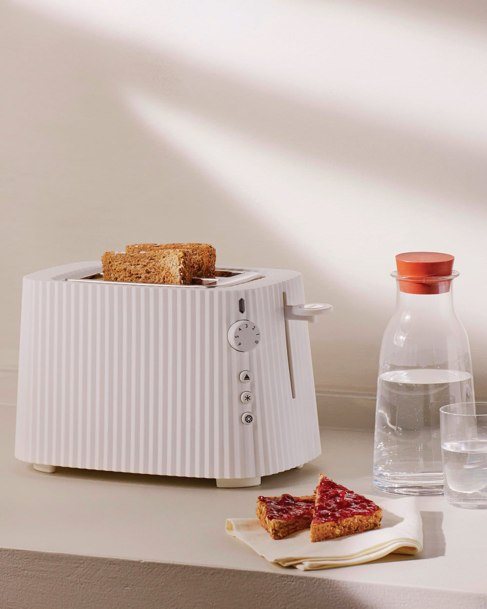 Elegantly designed statement toaster in black. Two slice electric toaster from Michele De Lucchi featuring his iconic pleated design. Prettiest kitchen appliances ever?