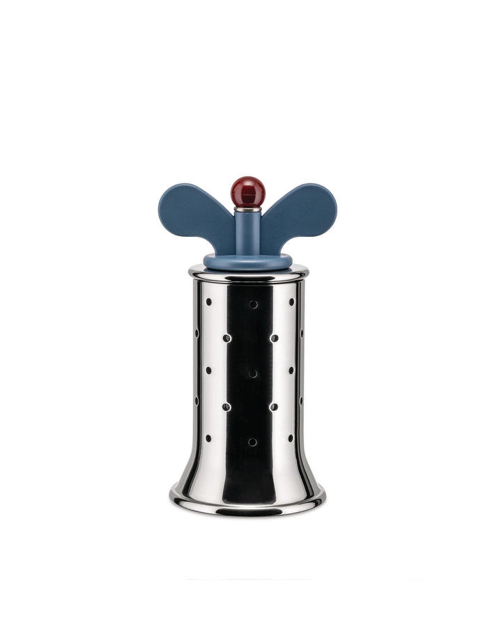 The Alessi 9098 pepper mill is a unique take on a dining essential. with a stainless steel body spotted body with a wide base. The pepper mill features a thermoplastic top which resembles traditional wind up toy mechanisms. Available in black and blue. 