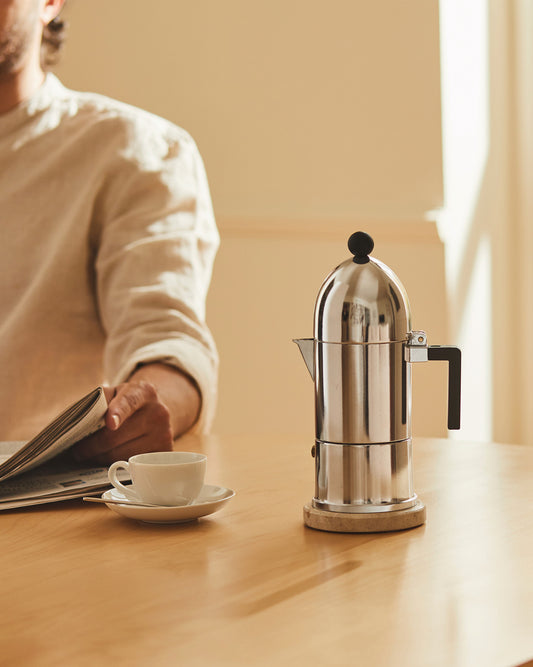 La cupola ESPRESSO COFFEE MAKER designed by Aldo Rossi for Alessi. This caffettiera is an Italian design classic, based on the original moka pot stovetop espresso maker. Contemporary & distinctive with its dome top and bullet-shaped body of polished aluminium