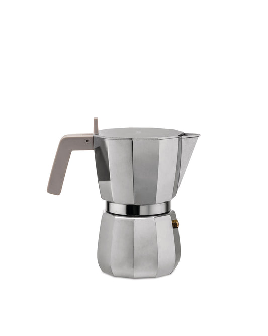 A moka coffee pot from designer Alessandro Mendini. Crafted from aluminium with a black plastic handle and knob, the moka coffee pot is a nod to the traditional espresso pot but with a playful rounded, wavy shape. Available in 1, 3 and 6 cup variations. 