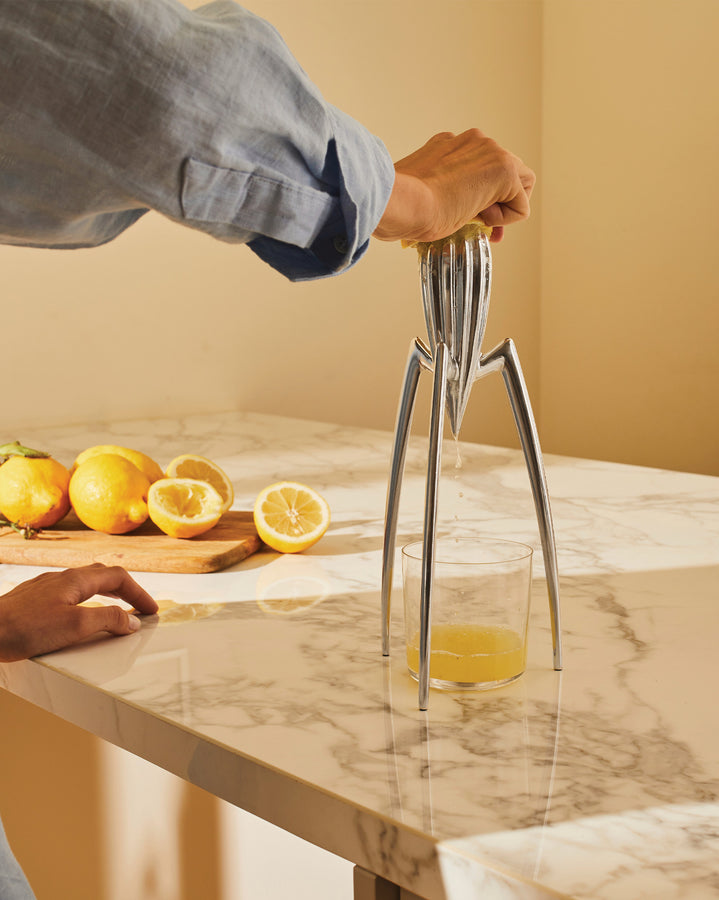 The most famous citrus juicer in the world, the Alessi Juicy Salif Citrus Squeezer, designed by Philippe Starck, is a kitchenware icon. Polished aluminium tripod design
